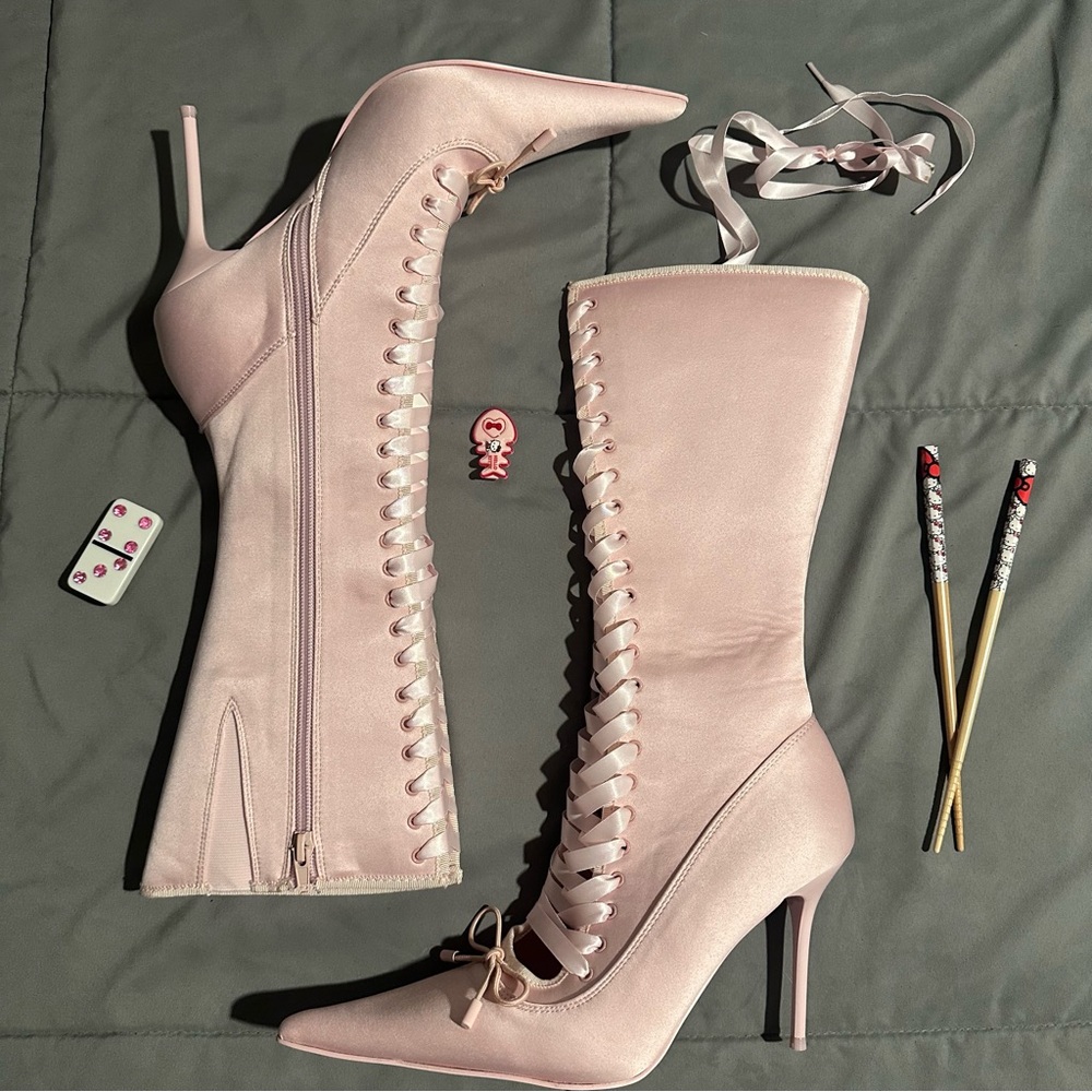 scandalous seduction heeled boots in pink by sugar thrillz (dolls kill)
